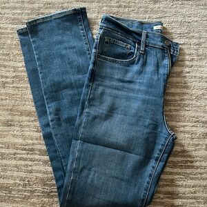 Levi jeans, style 724, size 29 in medium wash.